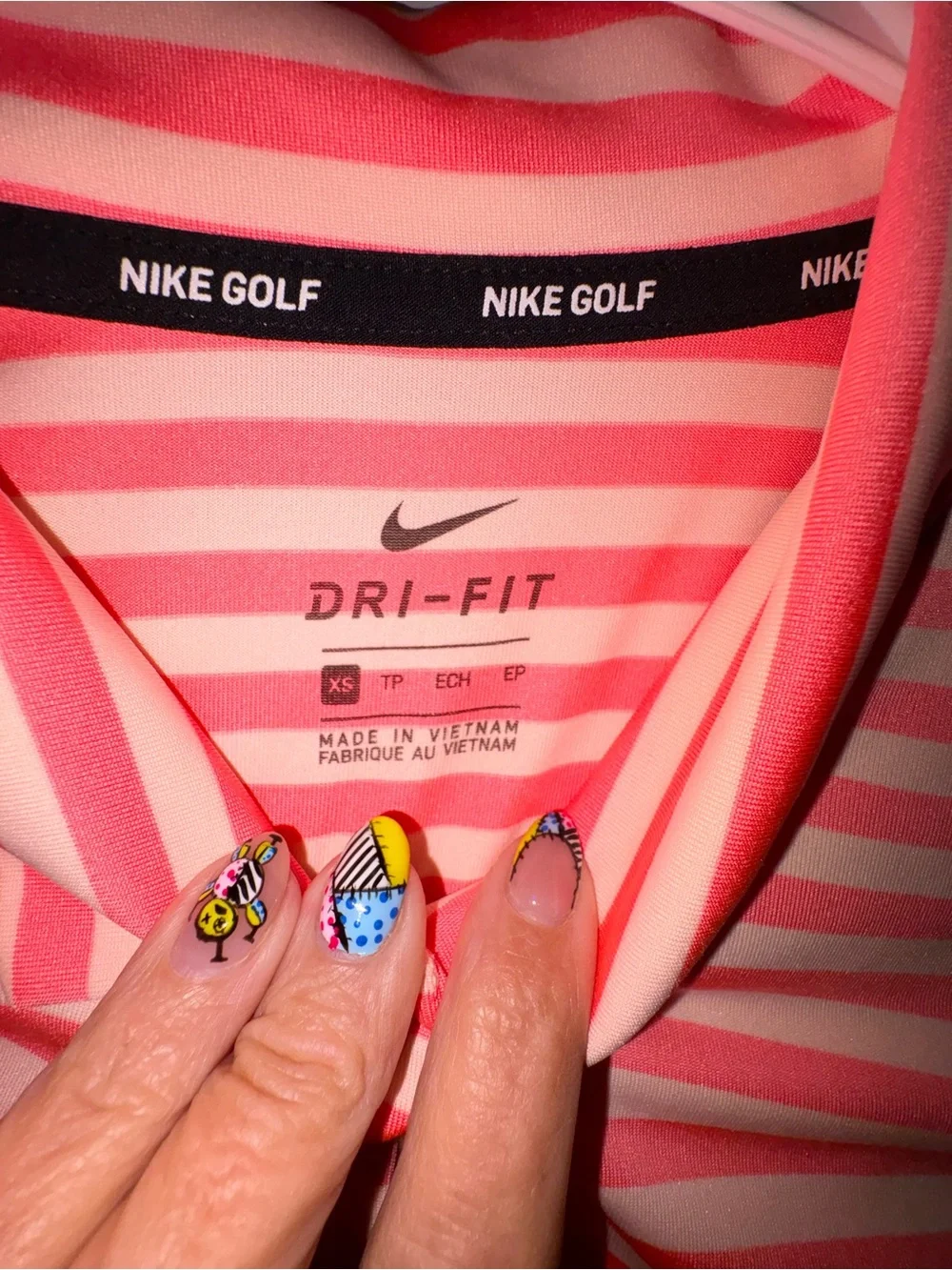 Nike Golf Coral and White Striped Dri-FIT Polo